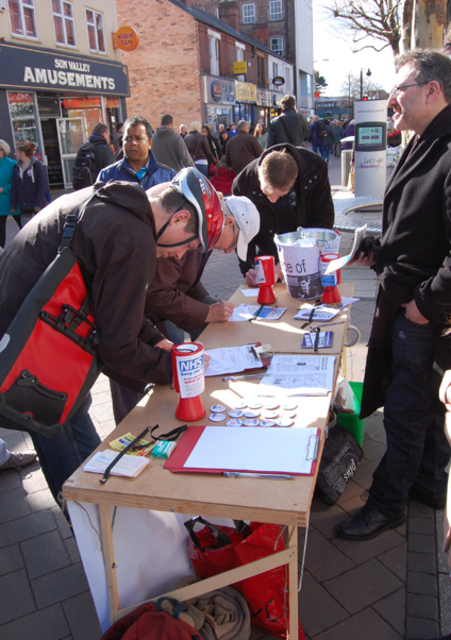 Signing_of_post_cards-medium